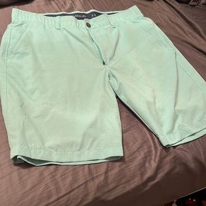 Under Armour teal golf shorts